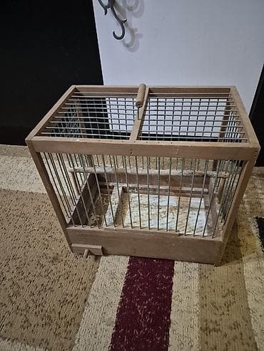 Taxta quş qəfəsi Ölçülər: - Uzunluq: 29 sm - Hündürlük: 26 sm - En — 2