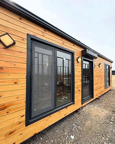 Taxta fasadlı müasir modul ev - Korpus: metal karkas, xaricdə təbii