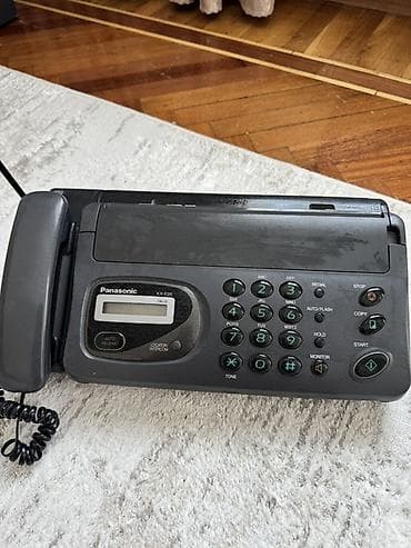 Su qızdırıcı kranlar: Stasionar telefon Panasonic, Simli — 1