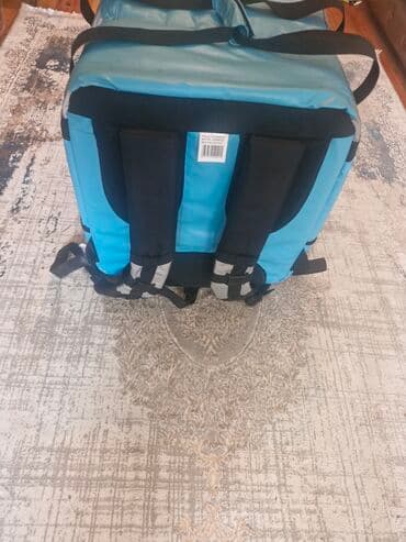 wolt cantaları: Mavi rəngdə Wolt çatdırılma çantası, qida və ya digər əşyaların — 5