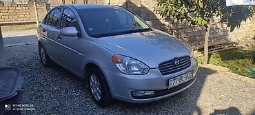 ulduz disk: Hyundai Accent: 1.5 l | 2008 il Sedan — 1