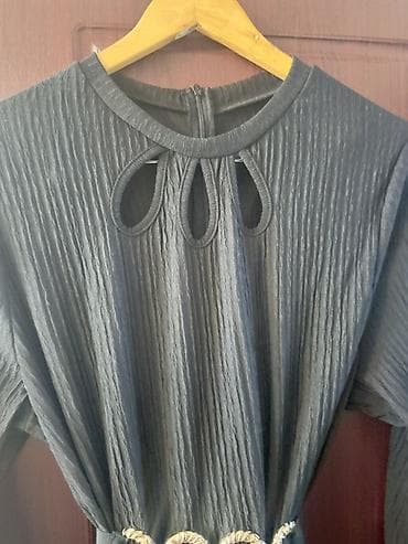 Paltar-kombinizon. Ölçü 2XL. Yenidir, heçvaxt geyinilməyib. Rəng — 5