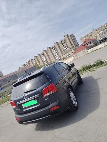 e 3 2: Kia Sorento: 2 l | 2010 il Ofrouder/SUV — 7