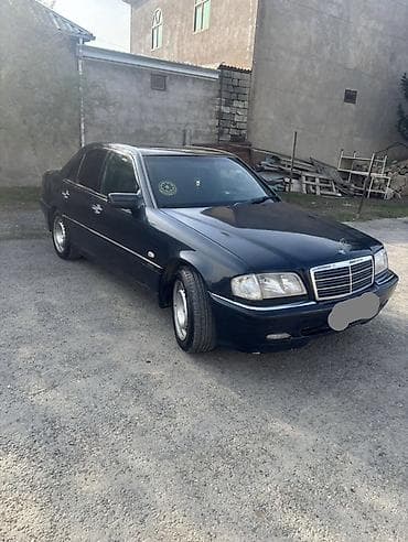 Mercedes-Benz: Mercedes-Benz C-Class: 2.4 l | 1997 il Sedan — 4
