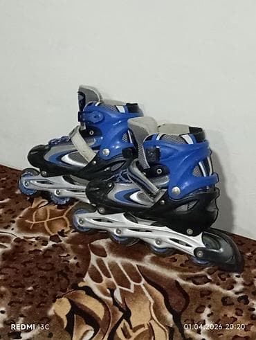 детский костюм для плавания: İkisi 50 manatdı, tək qırmızı 30, tək göy 25. İnline konkis (roller — 3