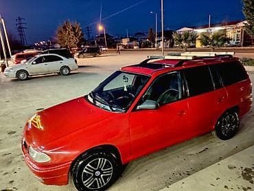 vaz 2107 maşını: Opel Astra F Caravan (universall) – qırmızı rəng. şəxsi sahibiyəm Heç — 10