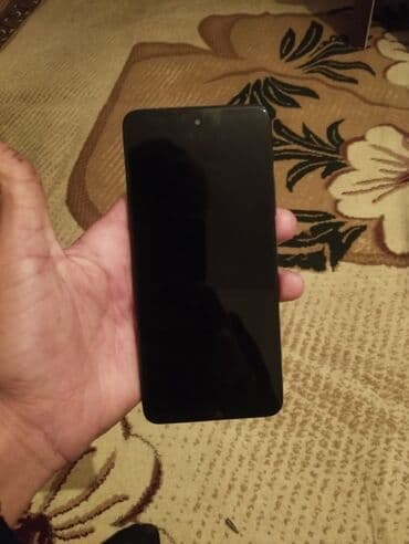 xiaomi mi 910: Xiaomi Redmi smartfon - Arxa paneldə “Redmi” loqolu, mat qara korpus — 2