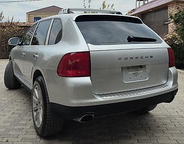 mitsubishi lancer evolution: Porsche Cayenne (1-ci nəsil) – gümüşü rəngdə premium SUV. İli 2008 — 6