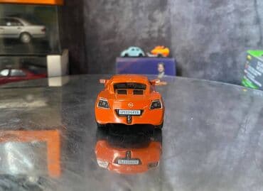 metbex tavan modelleri: Коллекционная модель Opel Speedster orange 2000 DeAgostini Art  — 7