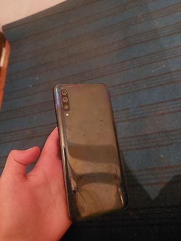 Samsung Galaxy A50, 128 ГБ, цвет - Черный, Отпечаток пальца — 1