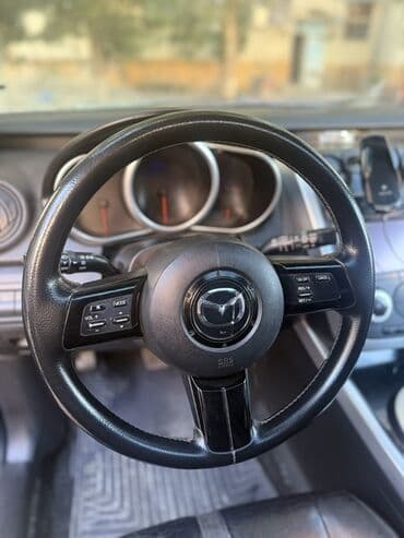 купить чехлы на авто: Mazda CX-7: 2.3 л | 2009 г. Кроссовер — 7