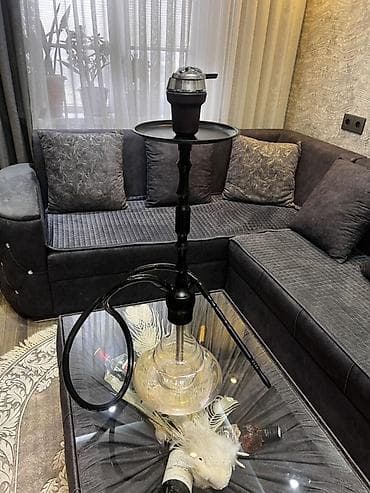 Xüsusiyyətlər: - Mat qara rəngdə, hündür şaquli ştativli gövdə - Geniş