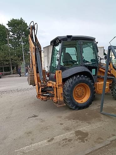 moto hisseler: CASE 580 Super R (4x4) ekskavator-yükləyici - İkiqat funksiyalı: ön — 8