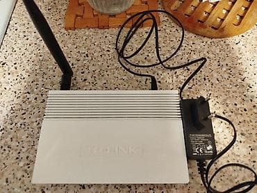 adapt: TP-LINK TD-W8961G simsiz ADSL2+ modem router. Model etiketində — 2