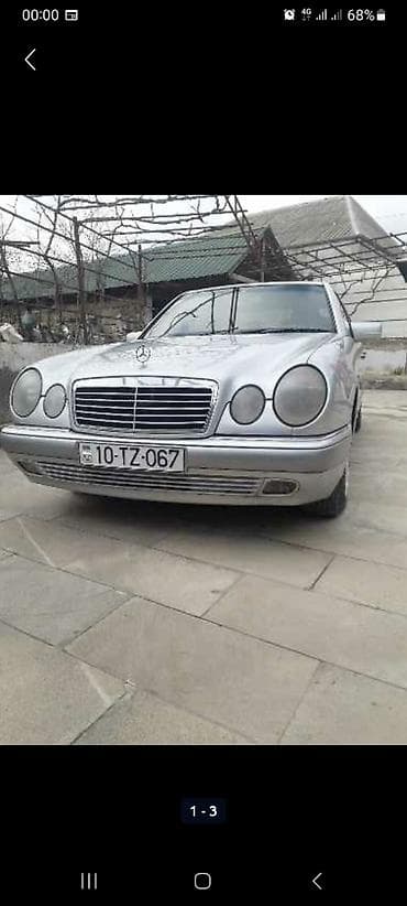 Mercedes-Benz E 200: 3 l | 1997 il Sedan