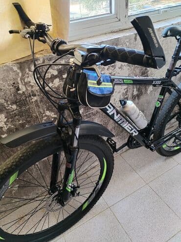 trinx x1 pro 2020: Panther markalı bu qara rəngli dağ velosipedi, yaşıl vurğularla — 2