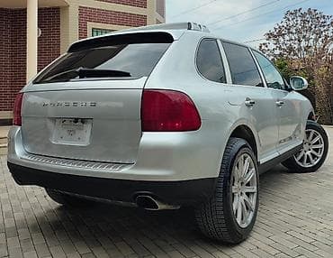 mitsubishi lancer evolution: Porsche Cayenne (1-ci nəsil) – gümüşü rəngdə premium SUV. İli 2008 — 8