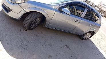 fort fujun buferi: Opel üçün orijinal təkər diskləri üçün dekorativ qalpaklar (hubcaps) — 1