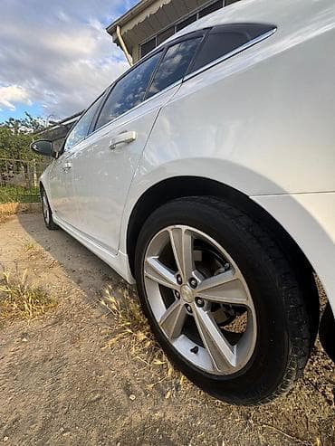 kia optima diffuser: Chevrolet Cruze: 1.4 l | 2014 il 230000 km Sedan — 4