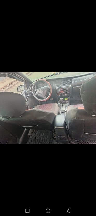 masinim var ag rengi: Opel sedan – komfortlu və praktik gündəlik minik avtomobili. - Kuzov — 8