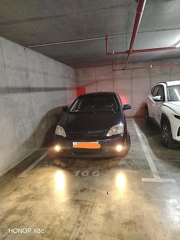 vito disk: Toyota Corolla hatchback (E12), tünd mavi rəng. - Kuzov: 5 qapılı — 1