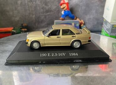 metbex tavan modelleri: Коллекционная модель Mercedes-Benz 190E 2.3 16V W201 gold 1984 EDICOLA — 15