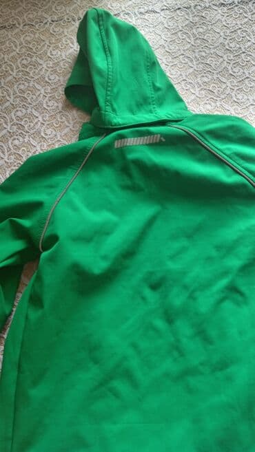 qar qiz paltari: Uşaq üçün yaşıl rəngdə kapüşonlu jaket. Xüsusiyyətlər: - Ölçü: 7 yaş — 4