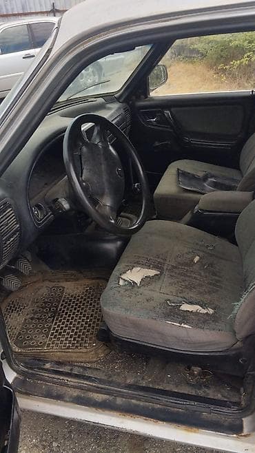 gence masin salonu: GAZ Volga 3110 sedan - Kuzov: 4 qapılı sedan, gümüşü rəng - Mühərrik — 6