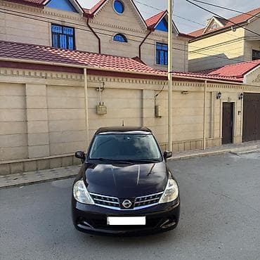 vaz on şuşə: Nissan Tiida: 1.5 l | 2011 il Hetçbek — 10