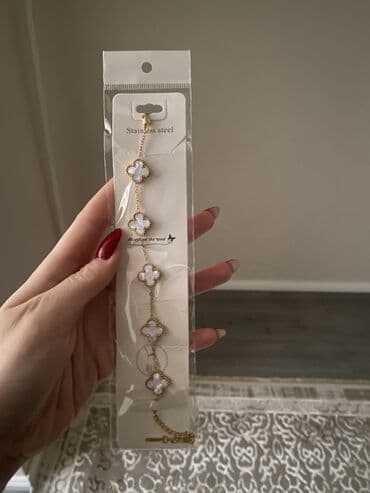 bujuteriya: Məhsul: Paslanmayan poladdan zərif qolbaq Təsvir: - Material — 2