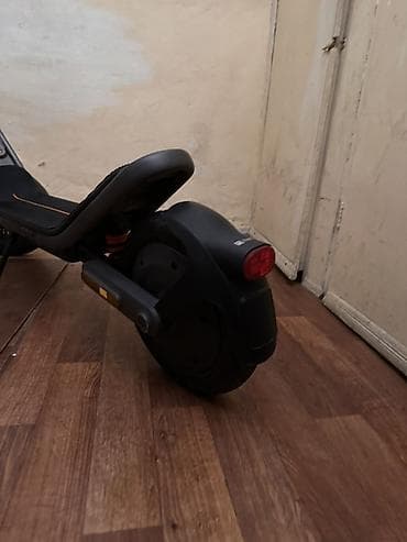 electro gitara: Elektrikli skuter – Xiaomi/Ninebot üslubunda şəhər üçün rahat model — 5
