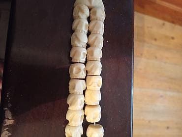 Məhsul: Oyma kəllə fiqurlu təsbeh/dua muncuqları Təsvir: - İki