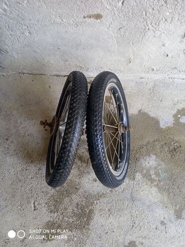 berkut velosiped: İki ədəd təkərli velosiped təkəri. Hər bir diskdə 28 mil var və qara — 3