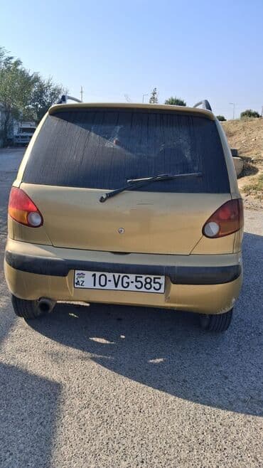 faizsiz kreditlə maşın: Daewoo Matiz, qızılı rəng, 5 qapılı şəhər avtomobili. Xüsusiyyətlər — 3