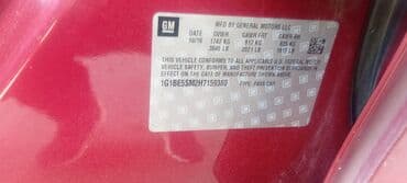 yağış sensoru: Chevrolet Cruze sedan – qırmızı (metalik) rəngdə, 4 qapı, arxa “CRUZE” — 9