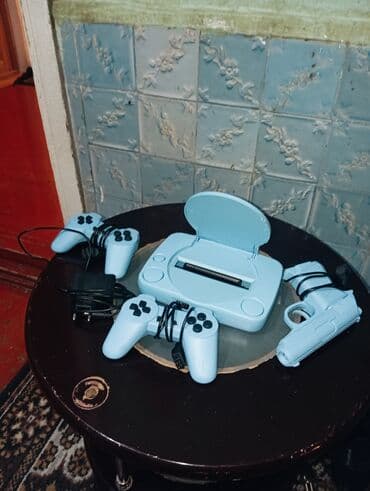 сколько стоит playstation 4: Açıq mavi rəngdə olan bu oyun konsolu dəsti evdə əyləncə üçün — 2
