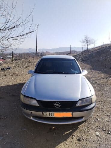 lizinq satilan avtomobiller: Opel Vectra sedan - Kuzov: 4 qapılı sedan, gümüşü rəng - Mühərrik — 2