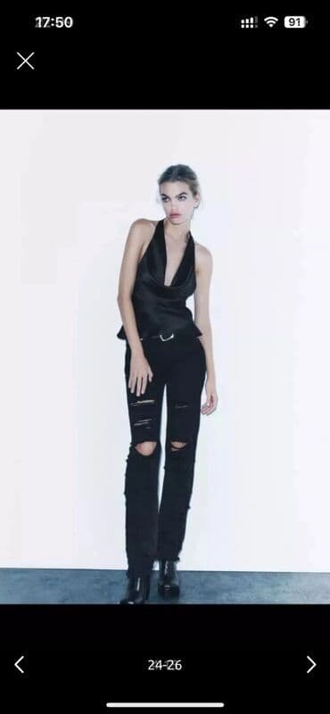 zeynep bastik baku: Zara Qara rəngli, yırtıq detallı cins şalvar. Dizlərdə və digər — 3