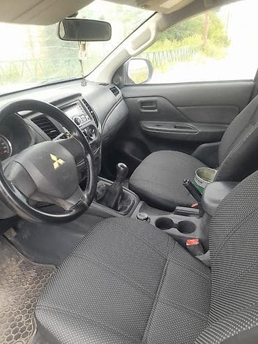 Mitsubishi L200: 2.4 л | 2019 г. 154800 км Пикап — 7