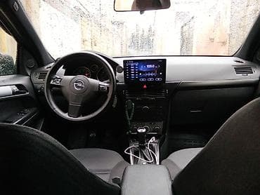 Opel: Opel Astra H, 5 qapılı hetçbek, boz rəng. - Yığcam və praktik kuzov — 7