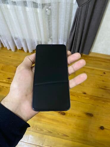 ТВ и видео: Xiaomi Mi 9, 64 ГБ, цвет - Черный, 
 Отпечаток пальца, Две SIM карты, Face ID — 4