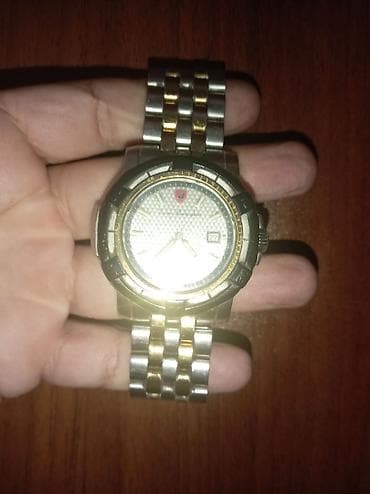 saat original: Kişi qol saatı – metal biləkbağı və təqvim funksiyalı - Korpus — 1