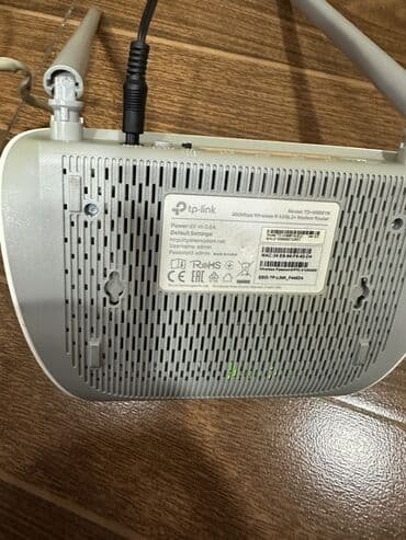 modem fiber optik: TP-Link simsiz marşrutlaşdırıcı, evdə və ya kiçik ofisdə internet — 3