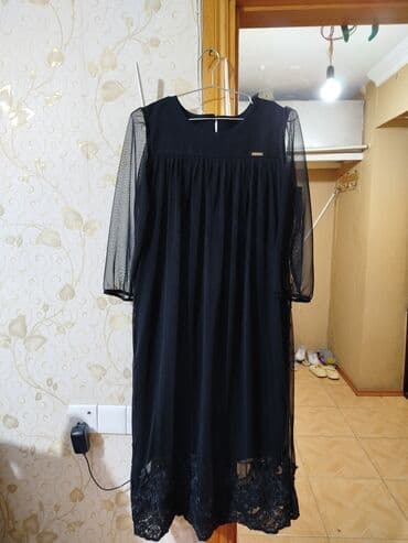 Qara rəngli zərif qadın paltarı.Geyinilib.Əlave endirim olacaq. -