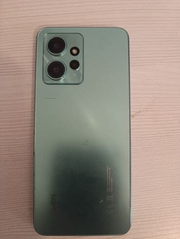 поясная машина бу: Redmi mobil telefonu, arxa tərəfində üç kamera və bir flaş ilə təchiz — 1