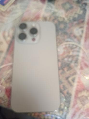 səs yazan: IPhone 15 Pro, Gümüşü, Face ID — 1