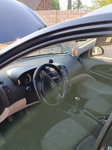 opel vektra a: Kia Ceed: 1.4 l | 2009 il Universal — 7