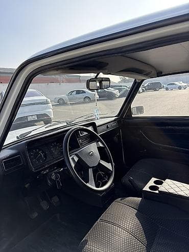 daewoo lanos 2011: Lada 2107, ağ rəng, sedan kuzov. Xarici: - Xrom ön barmaqlıq, kvadrat — 4