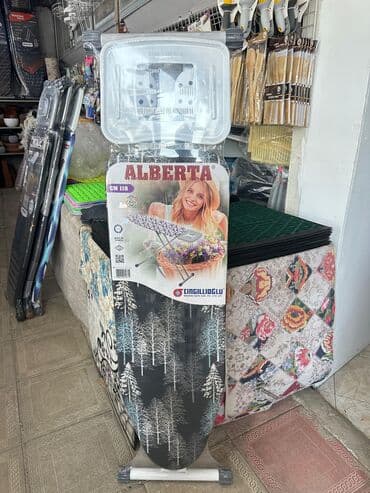 Otaq bitkiləri: Ütü masasi Ütü stolu ferqli dizayn ve ferqli seçimlerde utu utulemek — 9