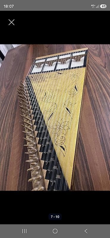 real gitara: Məhsul: Kanon(qanun) musiqi aləti Kanon (qanun) musiqi aləti Alet — 7